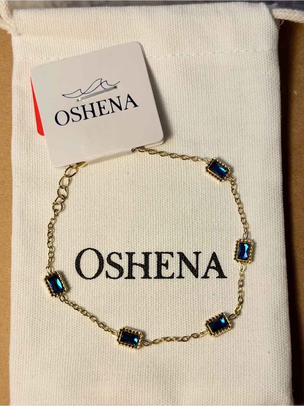 OSHENA Gold Chain Radiance Bracelet with Blue Stones - Picture 2 of 2